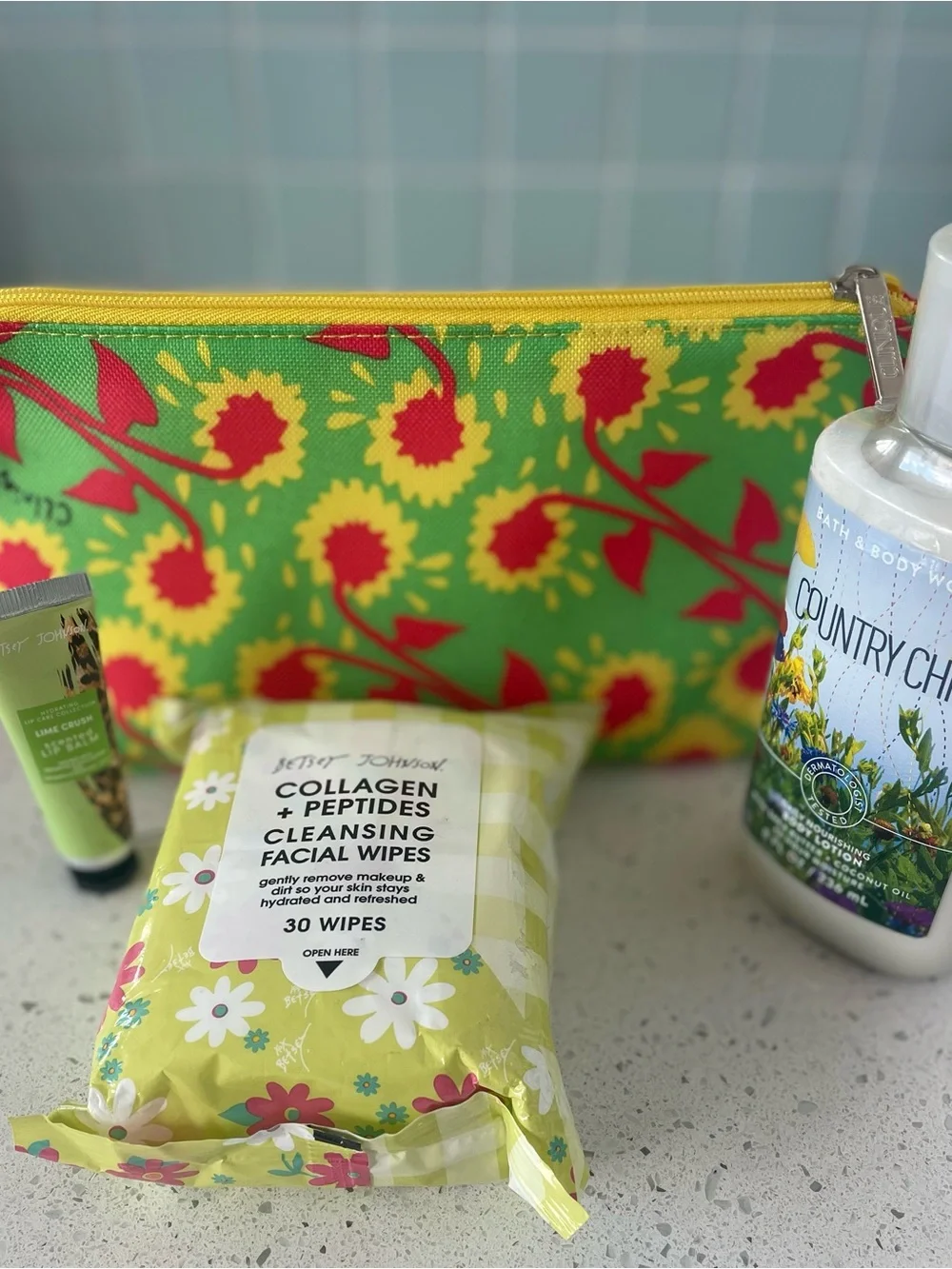 Bundle -Clinique Makeup bag, BBW lotion, Betsey Johnson face wipes, and lip balm